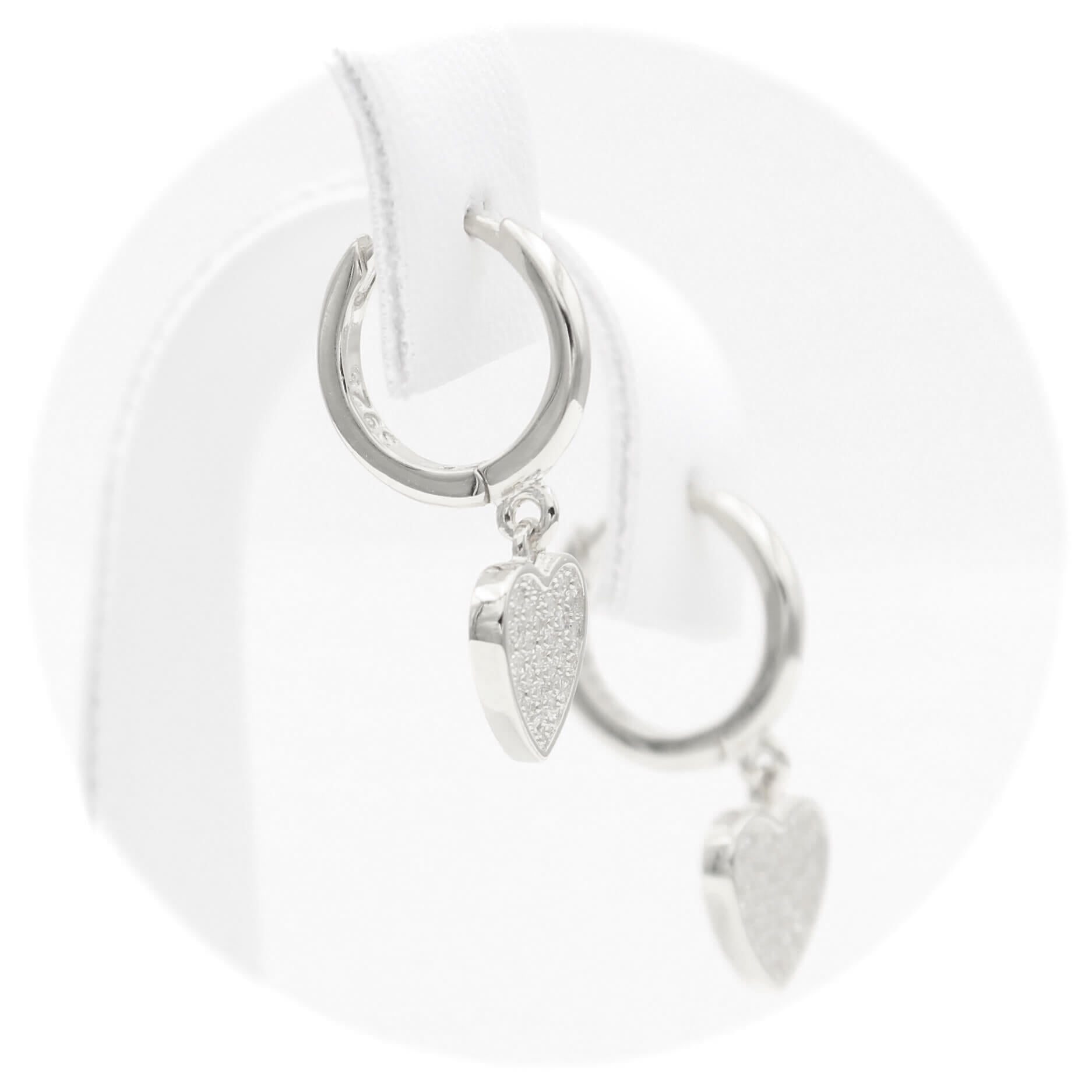 Ασημένια επιπλατινωμένα κρεμαστά σκουλαρίκια με καρδιές