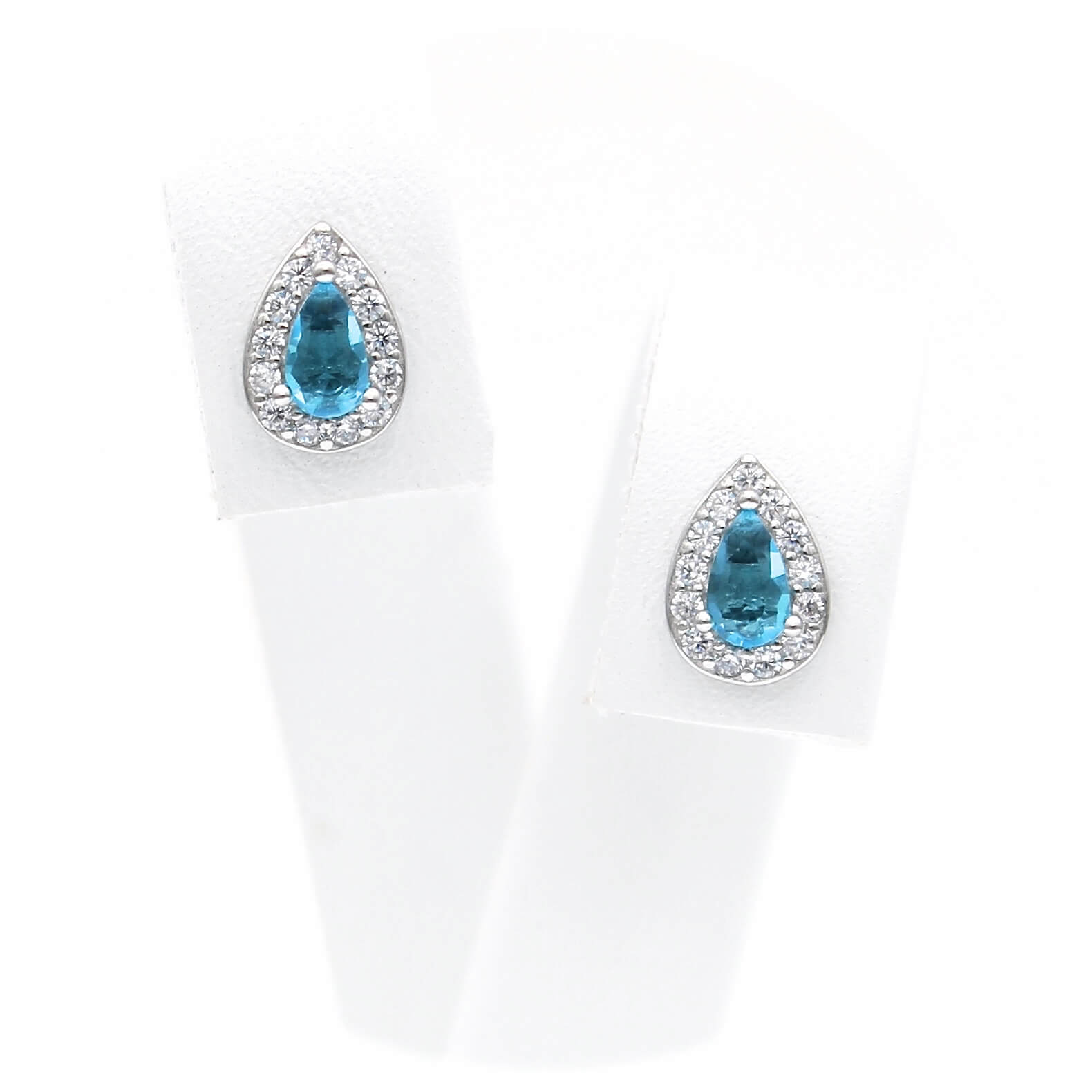 Ασημένια σκουλαρίκια ροζέτες σε σχήμα δάκρυ με γαλάζιες πέτρες