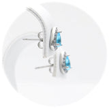 Ασημένια σκουλαρίκια ροζέτες σε σχήμα δάκρυ με γαλάζιες πέτρες