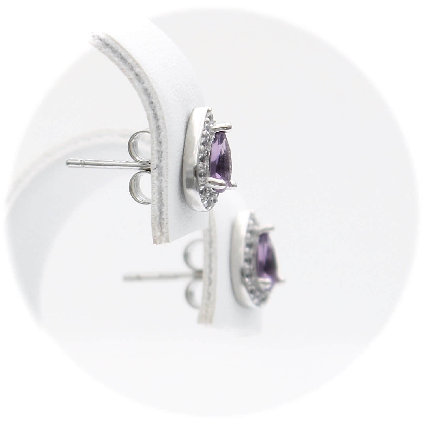 Ασημένια σκουλαρίκια ροζέτες σε σχήμα σταγόνας και μωβ πέτρες