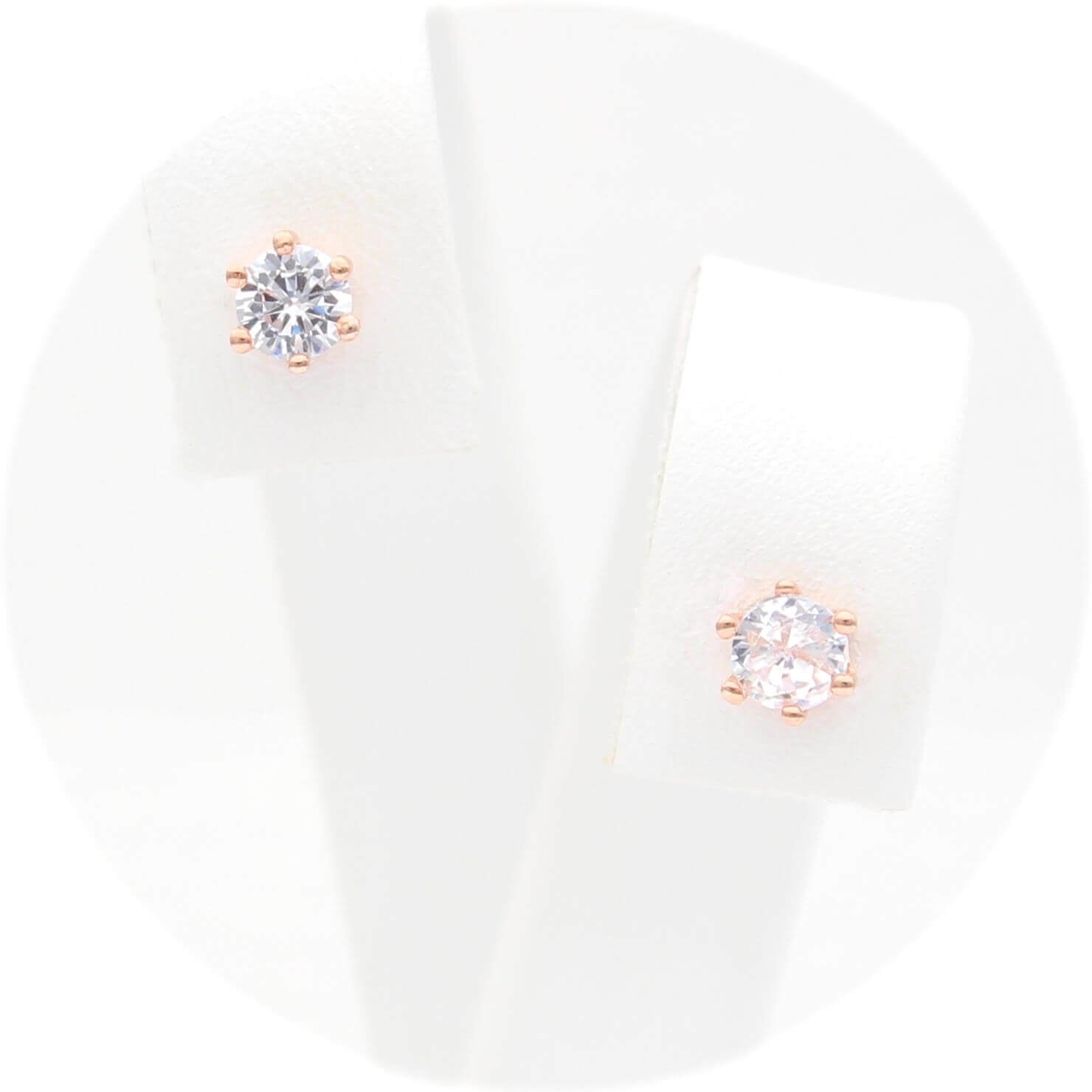 Ασημένια σκουλαρίκια σε ροζ χρυσό χρώμα με πέτρες ζιργκόν 4.00mm