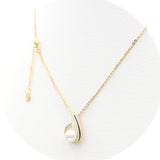 Ασημένιο κολιέ με μαργαριτάρι γλυκού νερού και ζιργκόν