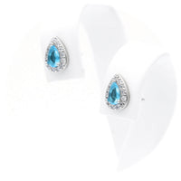 Ασημένια σκουλαρίκια ροζέτες σε σχήμα δάκρυ με γαλάζιες πέτρες