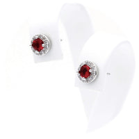 Ασημένια σκουλαρίκια ροζέτες σε στρογγυλό σχήμα με κόκκινες πέτρες ζιργκόν