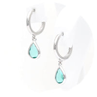 Ασημένια κρεμαστά σκουλαρίκια με γαλαζοπράσινες πέτρες ζιργκόν