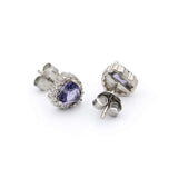 Ασημένια σκουλαρίκια ροζέτες σε σχήμα καρδιάς με μωβ πέτρες