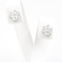 Ασημένια σκουλαρίκια με λευκά ζιργκόν 7.00mm