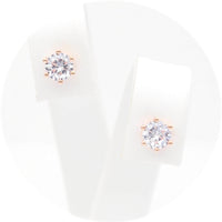 Ασημένια σκουλαρίκια σε ροζ χρυσό χρώμα με πέτρες ζιργκόν 5.00mm