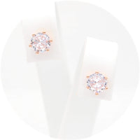 Ασημένια σκουλαρίκια σε ροζ χρυσό χρώμα με πέτρες ζιργκόν 6.00mm