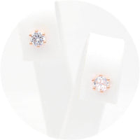 Ασημένια σκουλαρίκια σε ροζ χρυσό χρώμα με πέτρες ζιργκόν 4.00mm