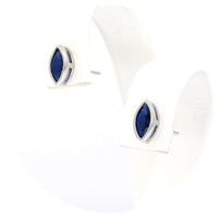 Ασημένια σκουλαρίκια με μπλε ωοειδές ζιργκόν