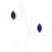 Ασημένια σκουλαρίκια με μπλε ωοειδές ζιργκόν