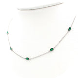 Ασημένιο κολιέ με πράσινες πέτρες ζιργκόν