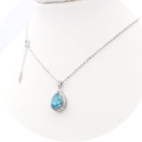 Ασημένιο κολιέ μοτίφ ροζέτα μπλε πέτρα