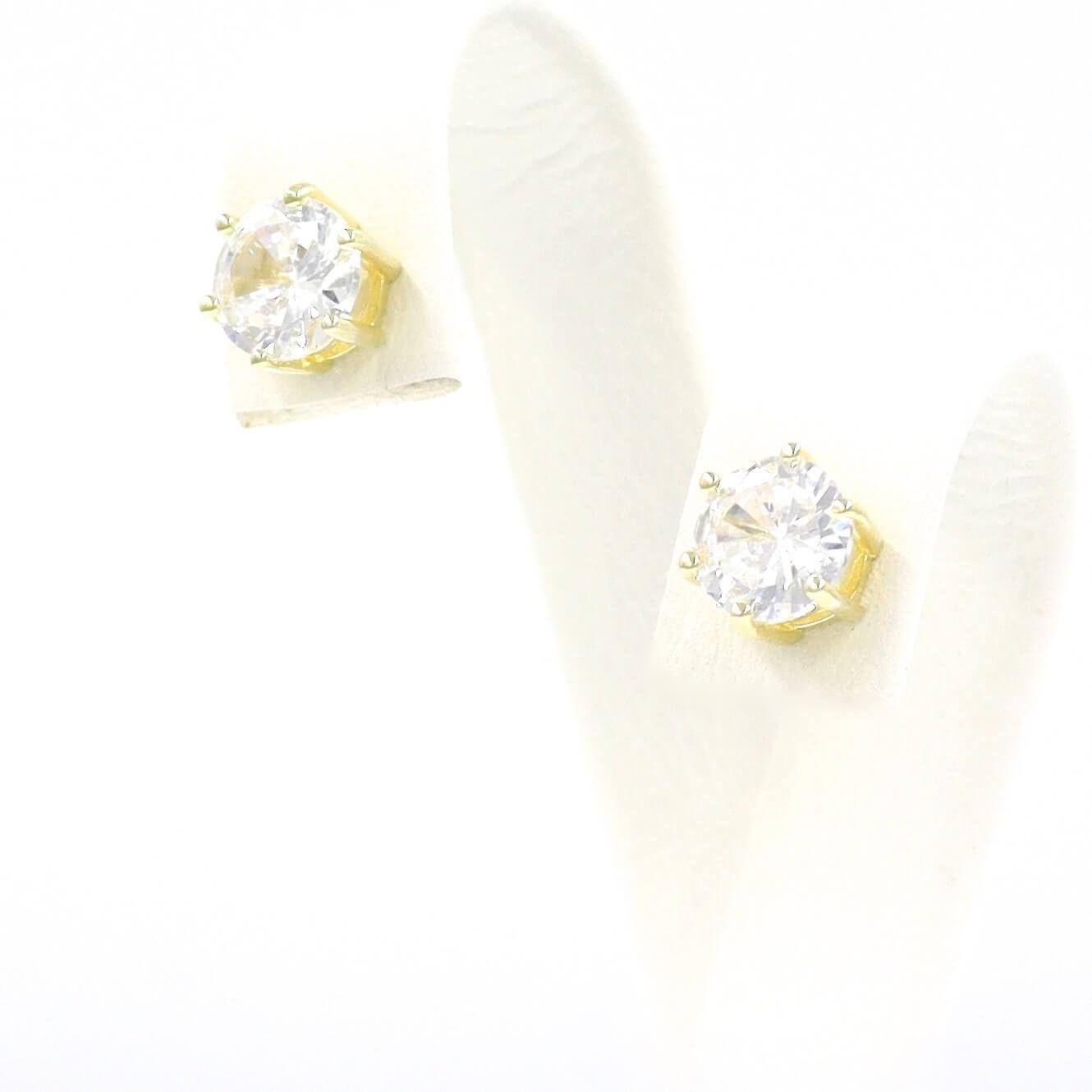 Μονόπετρα ασημένια σκουλαρίκια με λευκές πέτρες