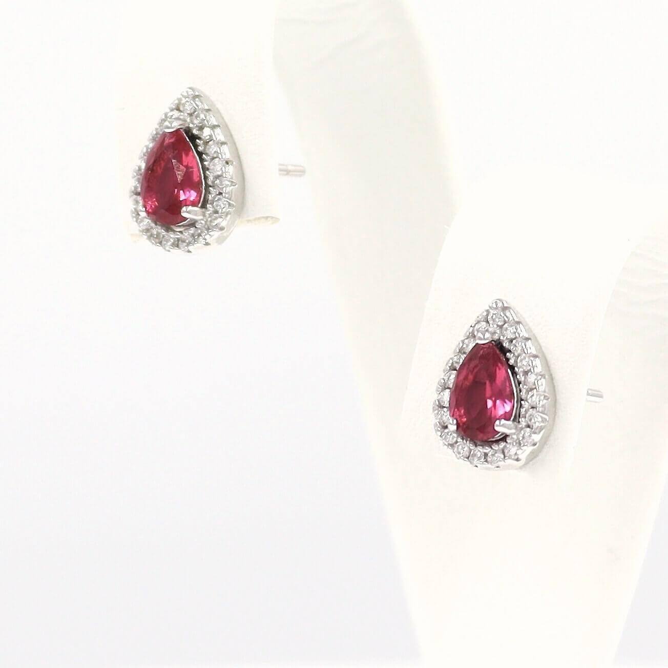 Σκουλαρίκια ασημένια ροζέτες, με κόκκινες πέτρες σε σχήμα σταγόνας