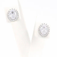 Σκουλαρίκια ροζέτες με λευκές πέτρες ζιργκόν