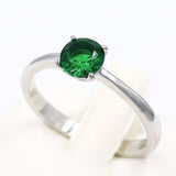 Ασημένιο μονόπετρο δαχτυλίδι με πράσινη πέτρα ζιργκόν