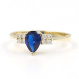 Δαχτυλίδι χρυσό με σκούρα μπλε πέτρα σε σχήμα δακρυ