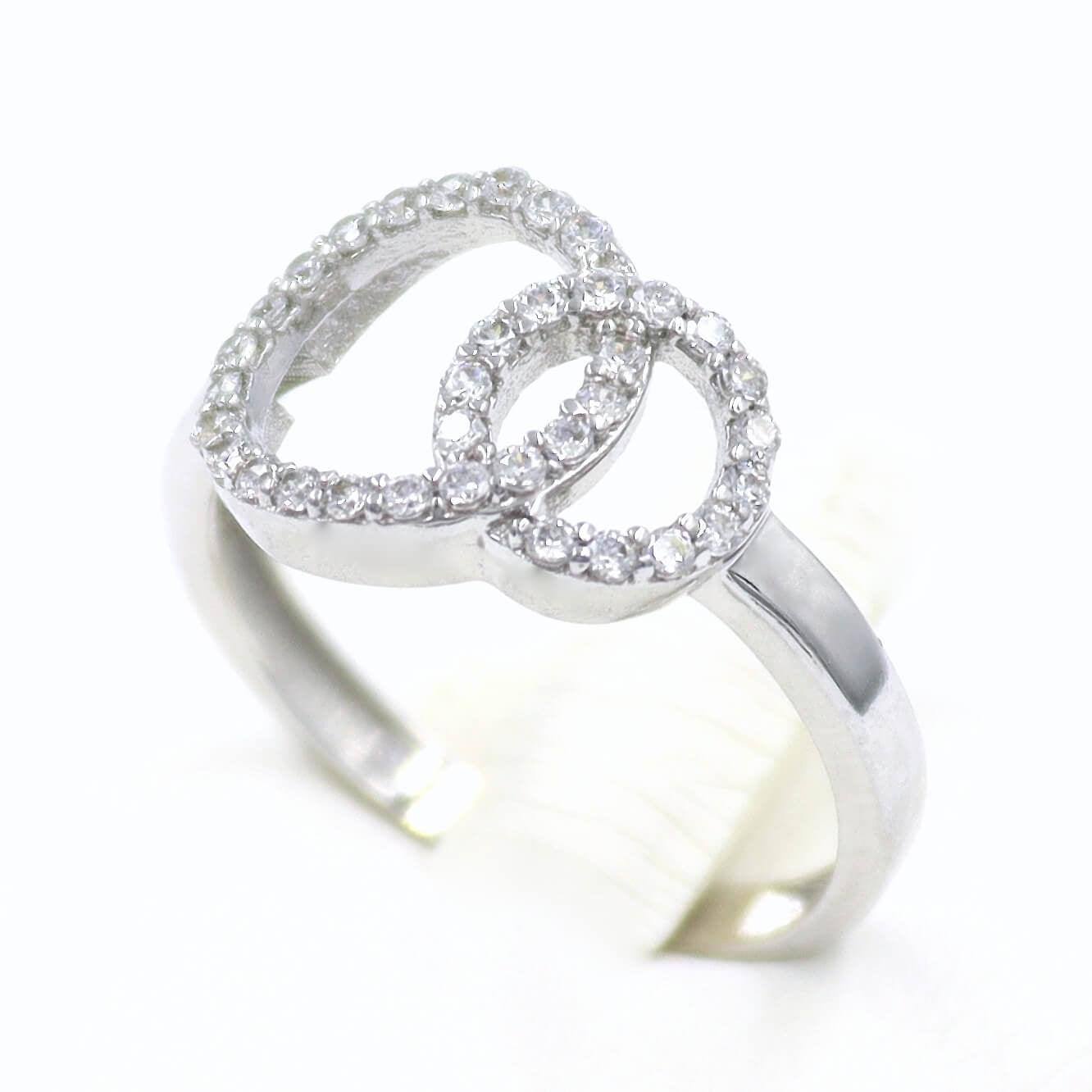 Λευκό χρυσό δαχτυλίδι γυναικείο, με λευκές πέτρες ζιργκόν